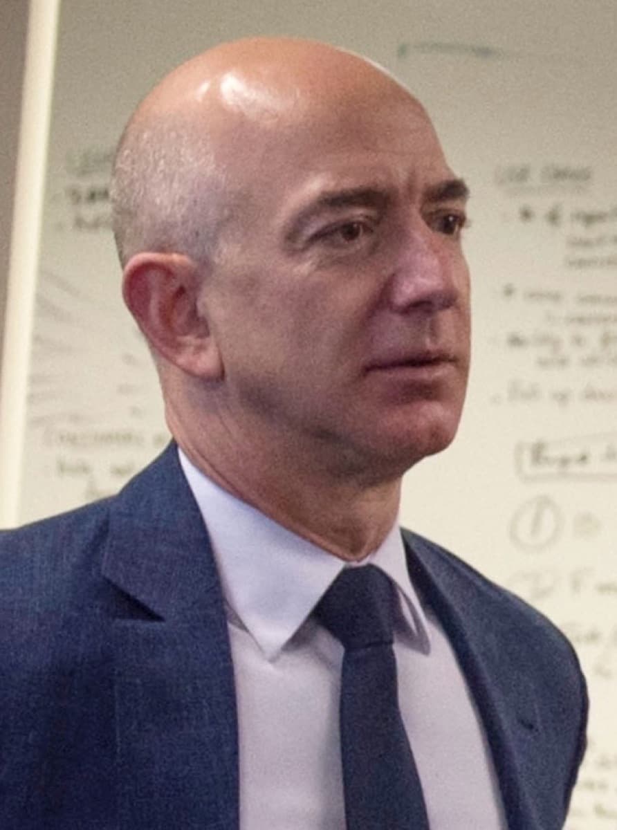 Jeff Bezos in a dark suit, 2016.